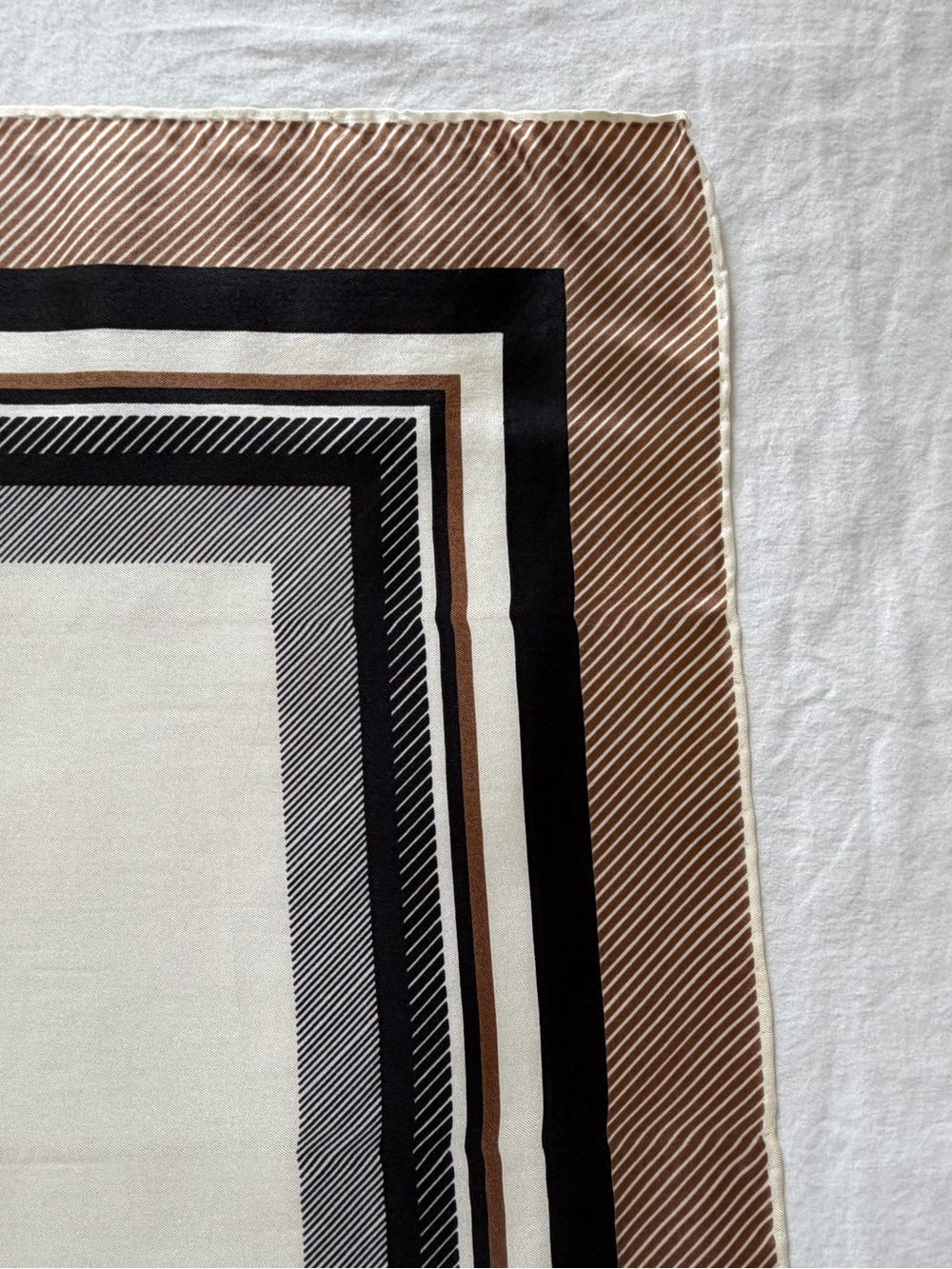 Echo Vintage Echo signed rolled-edge silk scarf featuring a brown, black, and wh - Picture 6 of 10